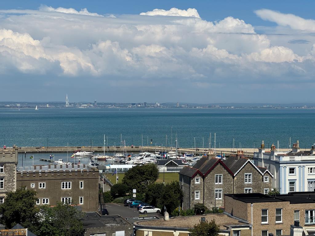 Lot: 156 - TWO STOREY THREE-BEDROOM FLAT FOR IMPROVEMENT WITH STUNNING SEA VIEWS AND PLANNING FOR SPLITTING IF PREFERRED - A View Towards Portsmouth From the Observation Tower